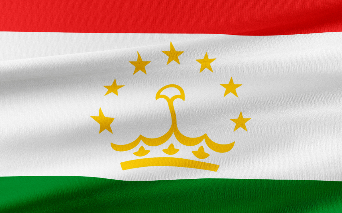 Close-up of the red, white and green horizontal stripes of the Tajikistan flag
